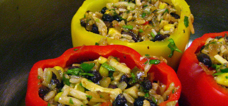 Enjoy The Colorful And Healthy Roasted Red Peppers Stuffed With Kale & Rice