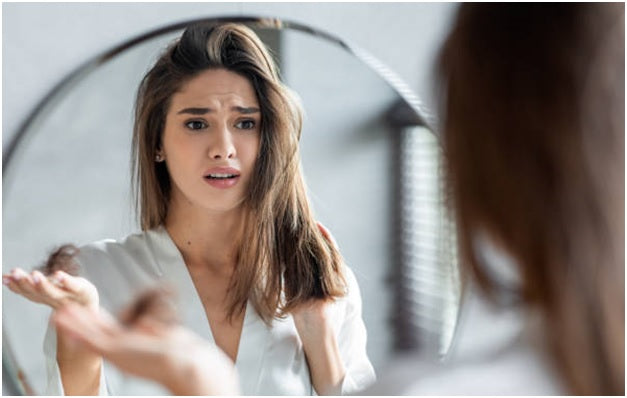 WHAT IS STRESS-RELATED HAIR LOSS, AND IS IT REVERSIBLE?