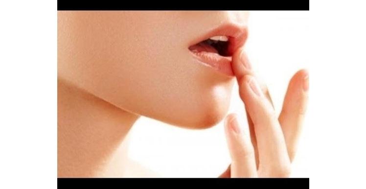 How do lip creams help in treating dark lips?