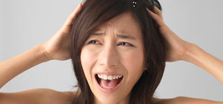Your Easy Guide To 4 Natural Dandruff Cures